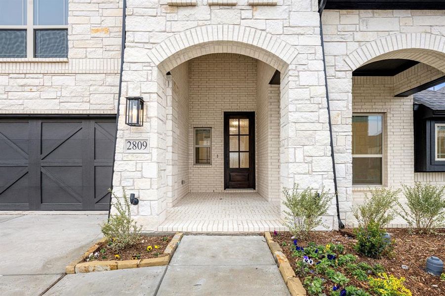 Exterior details and patio area of a home in Villages of Hurricane Creek, Anna (Image 3).