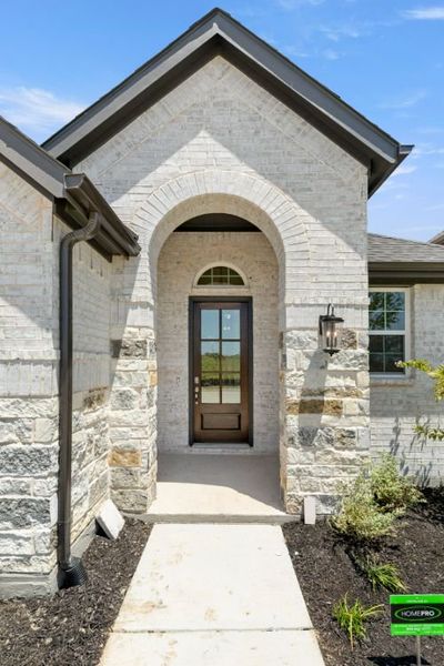 Representative exterior details of a home built from the Cypress by UnionMain Homes in Edgewater, Fate (Image 4).
