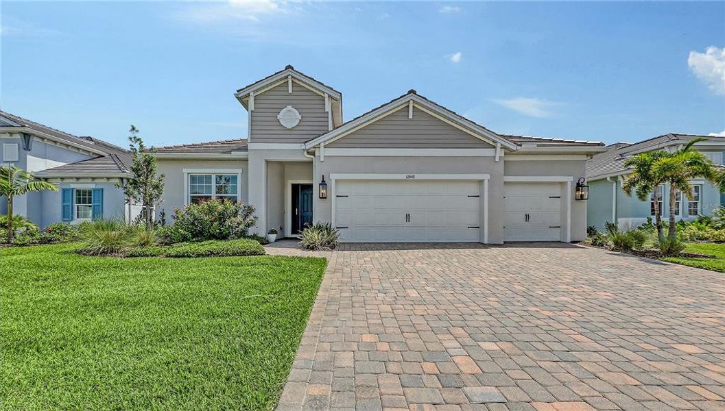 Front exterior of a new home in , Venice, FL, highlighting curb appeal (Image 26).