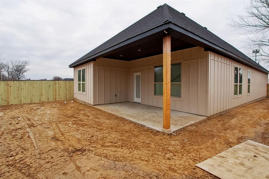 Back of house with a patio area