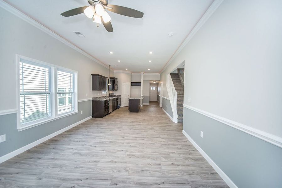 Representative unfurnished interior of a home built from the Quincy by Enchanted Homes in Lonesome Dove, San Antonio (Image 35).