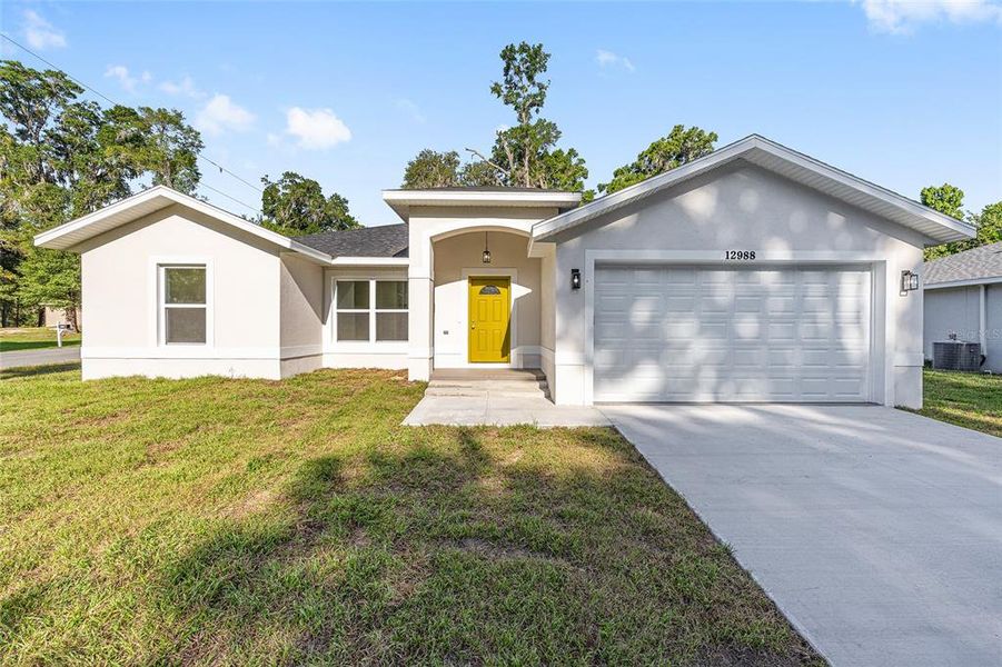 Front exterior of a new home in , Summerfield, FL, highlighting curb appeal (Image 19). Front exterior of a new home in , Summerfield, FL, highlighting curb appeal (Image 19).