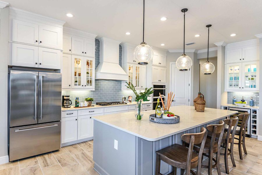 Representative furnished interior of a home built from the Kiawah 2 by Neal Communities in SkySail, Naples (Image 13).