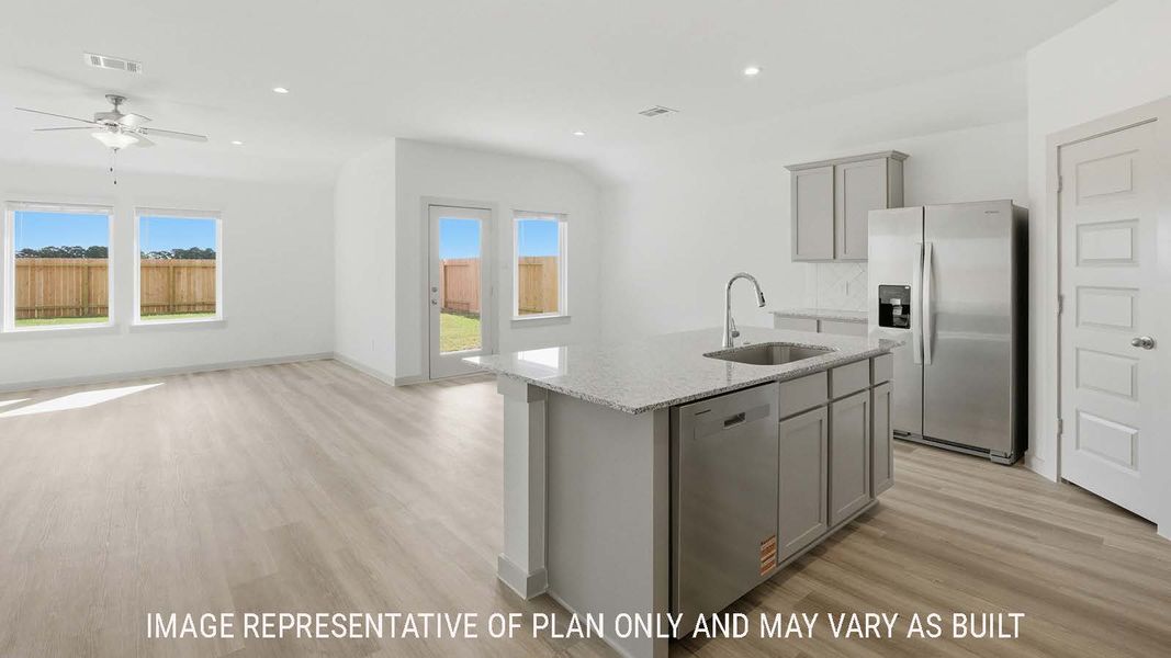 Furnished interior view inside a new home in Reserve at Mallard Lakes, Orange (Image 7).