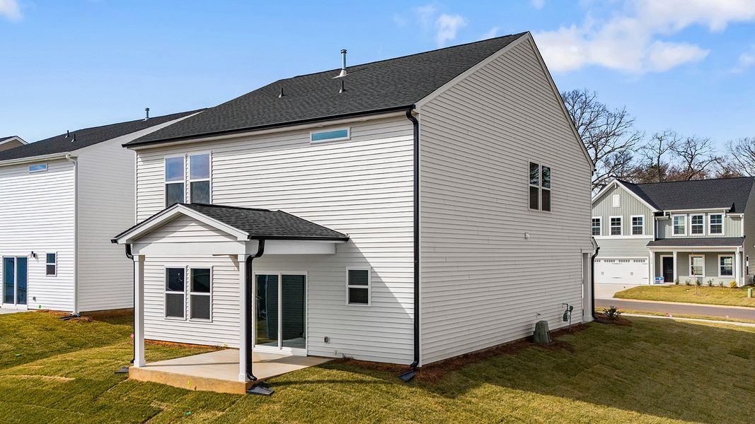 Exterior details and patio area of a home in Hanes Lake, Winston-Salem (Image 4).