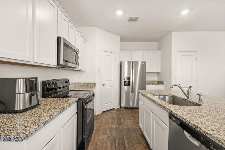 Furnished interior view inside a new home in Palomino, Manor (Image 19). Furnished interior view inside a new home in Palomino, Manor (Image 19).