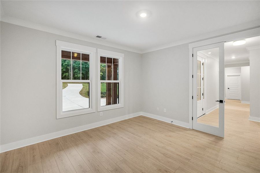 Bright windows frame exterior green views in this Bright windows frame exterior green views in this