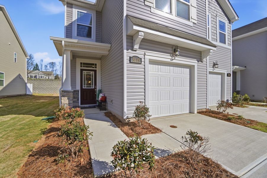 Exterior details and patio area of a home in Hedgecliff Townes, Kannapolis (Image 3). Exterior details and patio area of a home in Hedgecliff Townes, Kannapolis (Image 3).