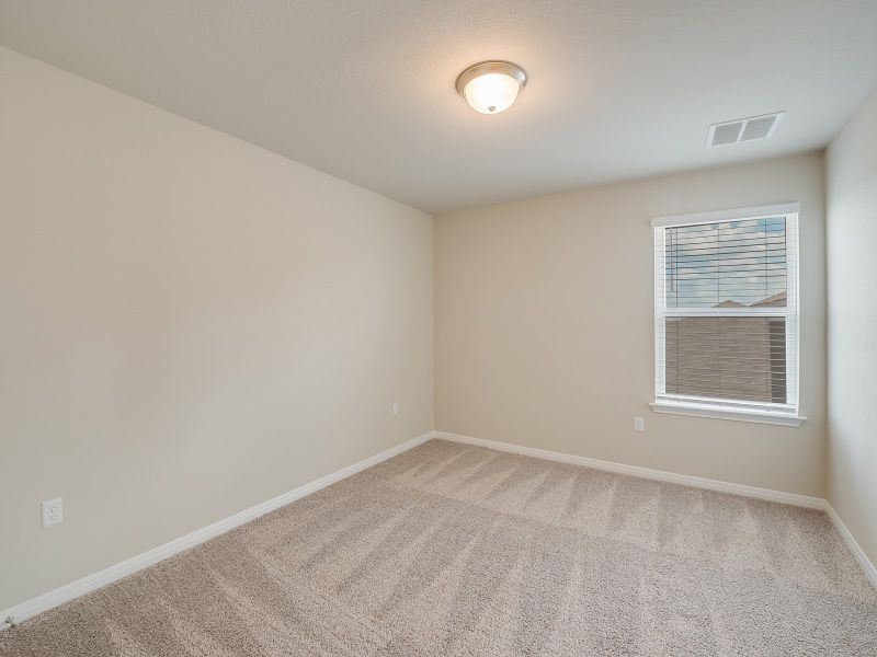 Spacious, unfurnished interior of a new home in Turner's Crossing - Reserve Collection, Buda (Image 12).