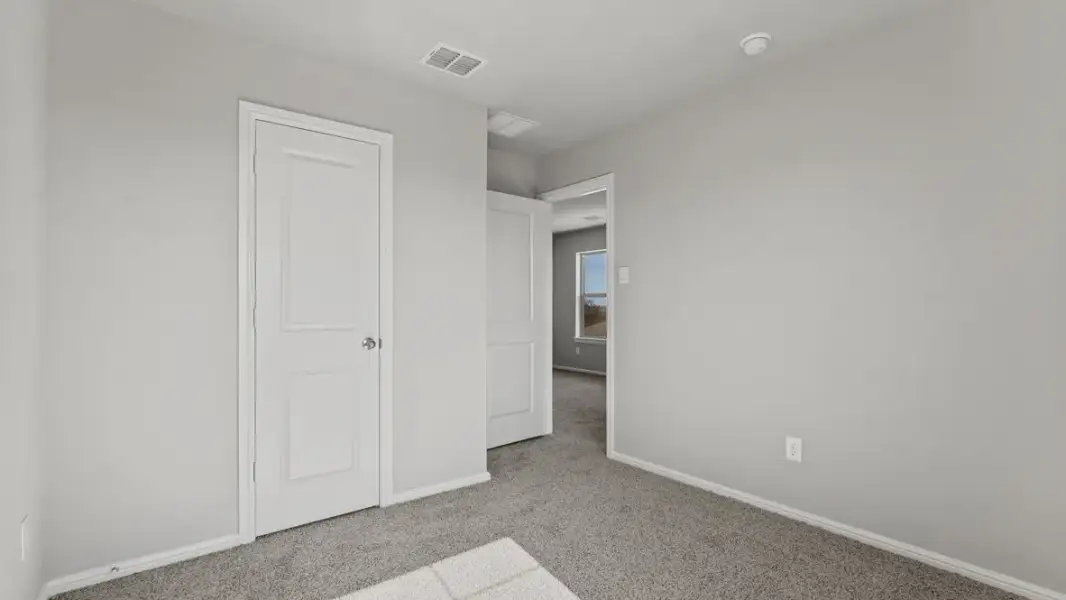 Representative unfurnished interior of a home built from the Midland by D.R. Horton in Audra Oaks, Denton (Image 42).