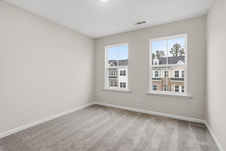 Spacious, unfurnished interior of a new home in Renaissance at White Oak, Garner (Image 31).