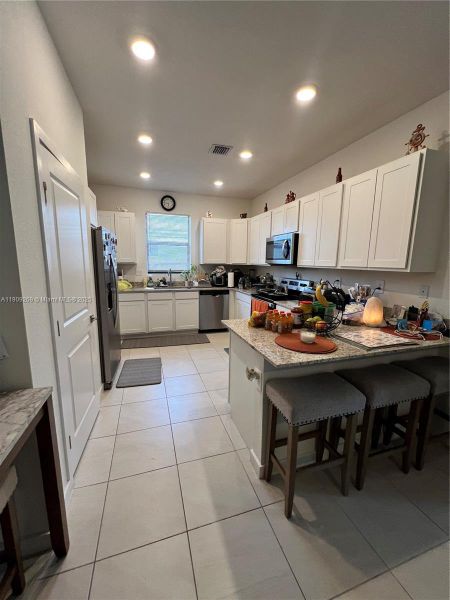 Furnished interior view inside a new home in , Homestead (Image 9). Furnished interior view inside a new home in , Homestead (Image 9).