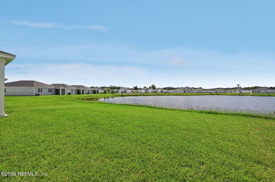 Exterior details and patio area of a home in Lakes at Bella Lago - Signature Series, Green Cove Springs (Image 3).
