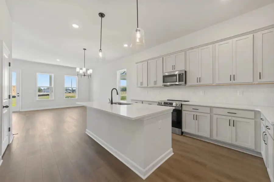 Sample Kitchen photo. Actual structural options and design finishes of home may vary.
