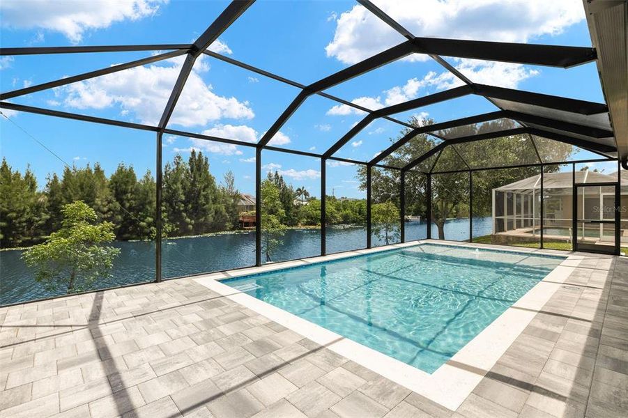 Pool with enclosed pool cage Pool with enclosed pool cage