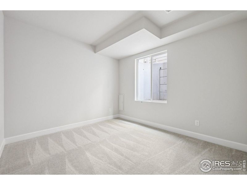 Spacious, unfurnished interior of a new home in The Villas Collection at Sterling Ranch, Littleton (Image 29).