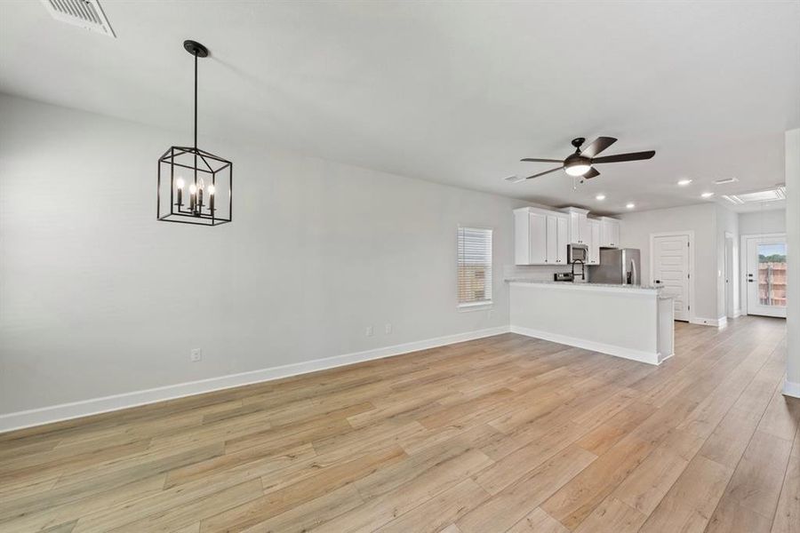 Spacious, unfurnished interior of a new home in Whisper Valley, Manor (Image 15).