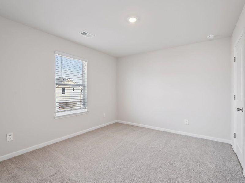 Spacious, unfurnished interior of a new home in Hawthorne Station, College Park (Image 19).