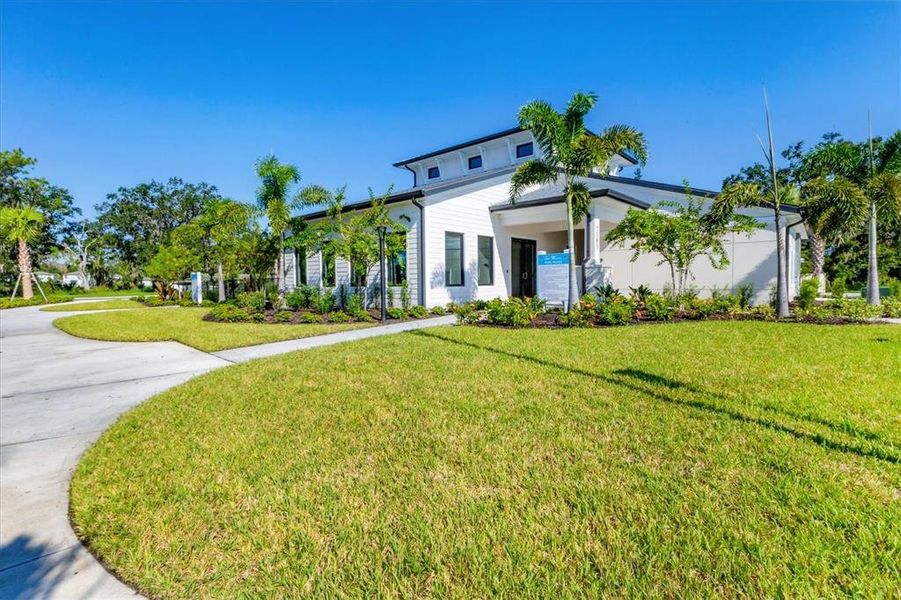 Front exterior of a new home in , Parrish, FL, highlighting curb appeal (Image 1).