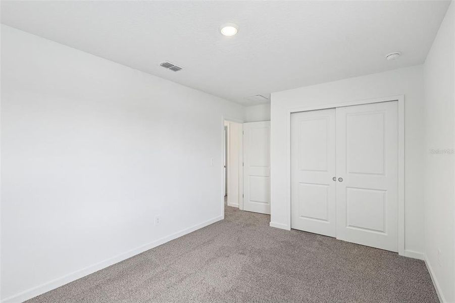 Spacious, unfurnished interior of a new home in Flagler Village - Signature Series, Palm Coast (Image 18). Spacious, unfurnished interior of a new home in Flagler Village - Signature Series, Palm Coast (Image 18).