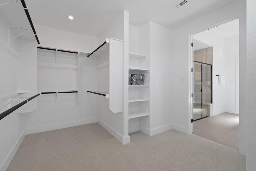 Walk-in closet in Primary Bedroom - Representative Photo