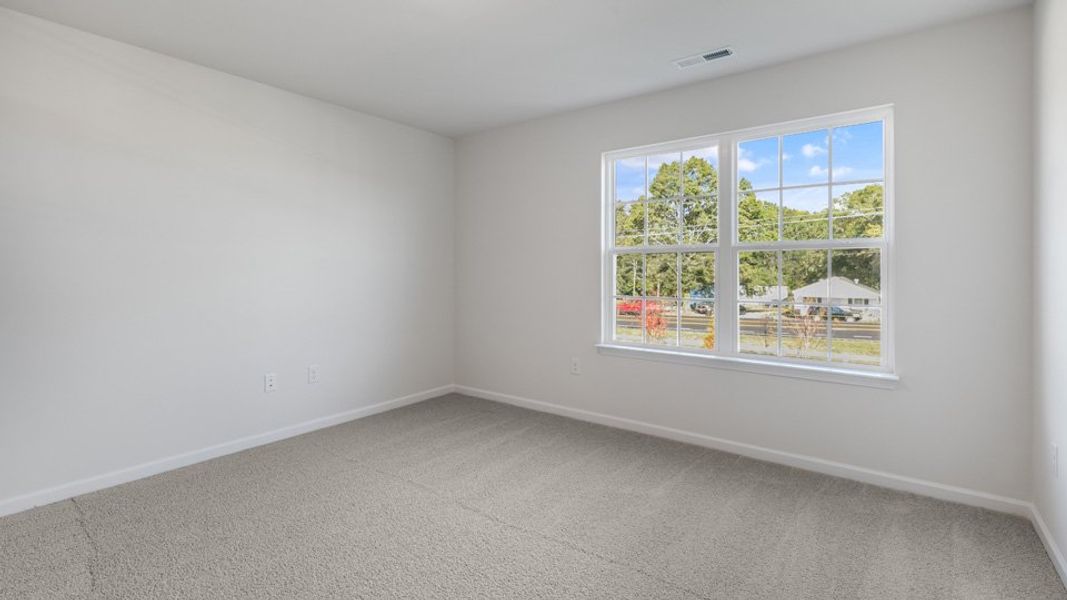 Spacious, unfurnished interior of a new home in Brightwood Farm, Whitsett (Image 12).