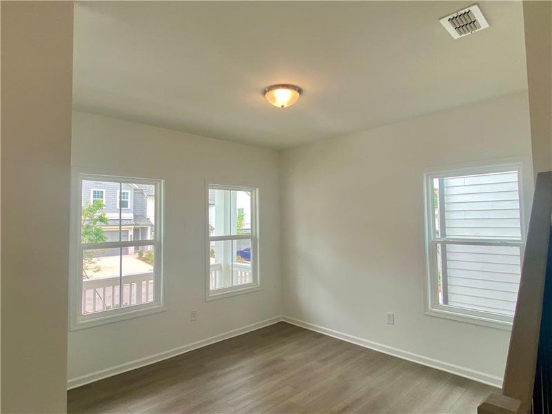 Spacious, unfurnished interior of a new home in Eastlyn Crossing, Flowery Branch (Image 13). Spacious, unfurnished interior of a new home in Eastlyn Crossing, Flowery Branch (Image 13).