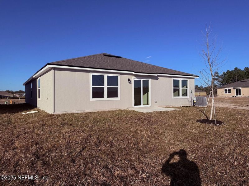 Exterior details and patio area of a home in The Arbors, Jacksonville (Image 3).