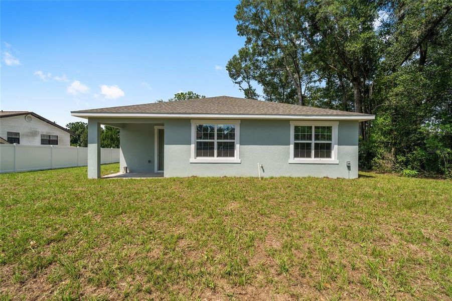 Front exterior of a new home in , Summerfield, FL, highlighting curb appeal (Image 25).