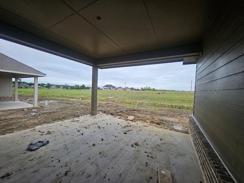 Covered concrete patio with a paneled ceiling and recessed lighting Covered concrete patio with a paneled ceiling and recessed lighting