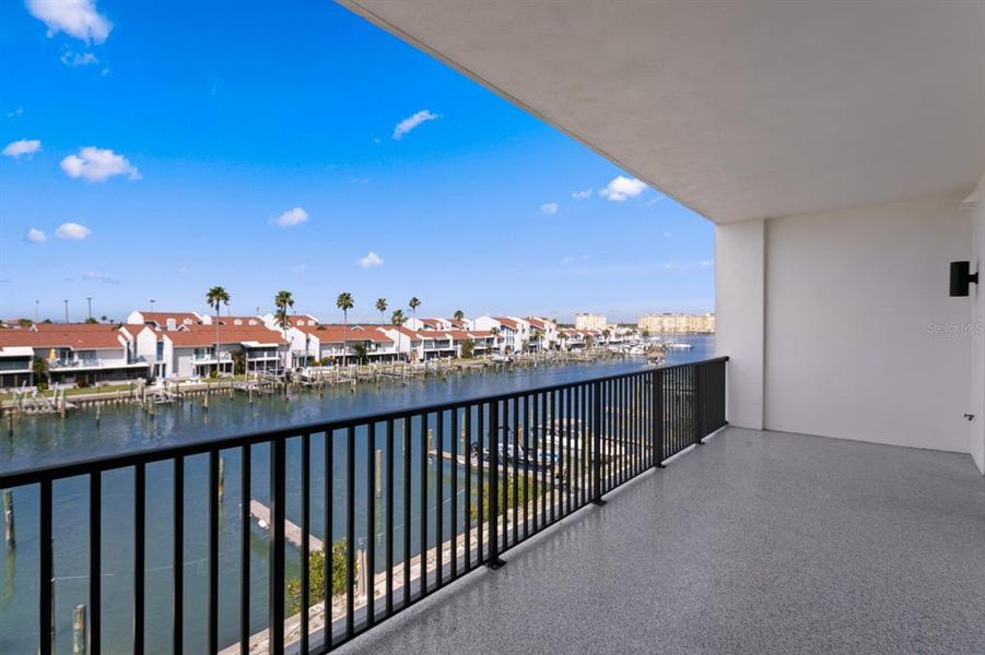Exterior details and patio area of a home in Residences at Town Center, Madeira Beach (Image 27).