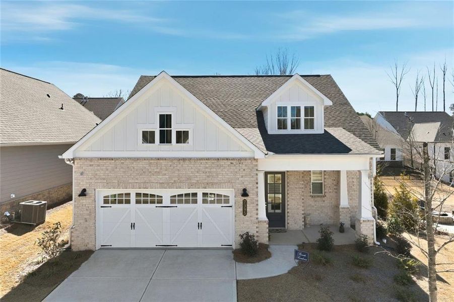 Front exterior of a new home in , Cumming, GA, highlighting curb appeal (Image 26). Front exterior of a new home in , Cumming, GA, highlighting curb appeal (Image 26).