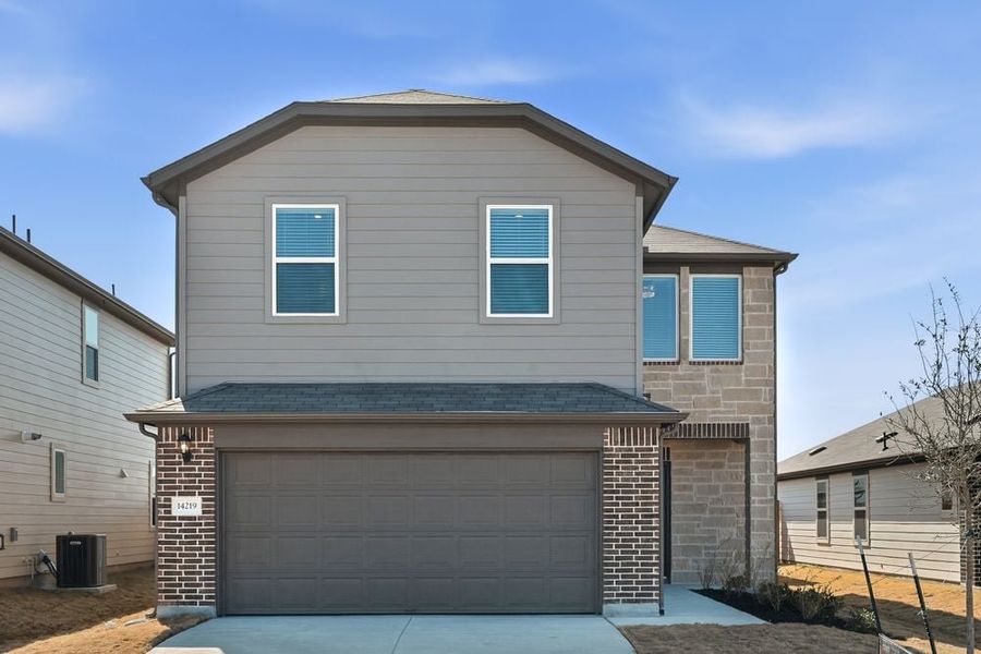 Representative exterior photo of a completed home built from the Harrier by Taylor Morrison in Stonewall Ranch, Liberty Hill, TX (Image 23).