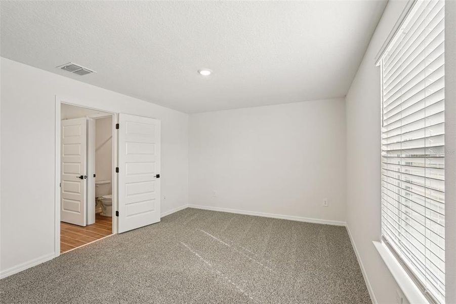 Spacious, unfurnished interior of a new home in Oakfield Trails - Signature Series, Parrish (Image 27).