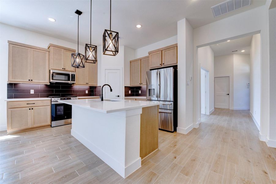 Furnished interior view inside a new home in The Woodlands Hills, Willis (Image 11). Furnished interior view inside a new home in The Woodlands Hills, Willis (Image 11).
