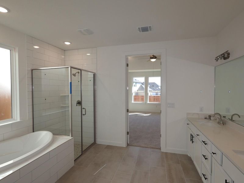 Furnished interior view inside a new home in Edgewood, Leander (Image 15). Furnished interior view inside a new home in Edgewood, Leander (Image 15).