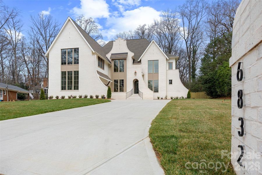 Front exterior of a new home in , Charlotte, NC, highlighting curb appeal (Image 28).