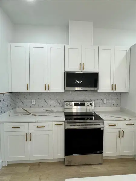 Furnished interior view inside a new home in , Frostproof (Image 4).