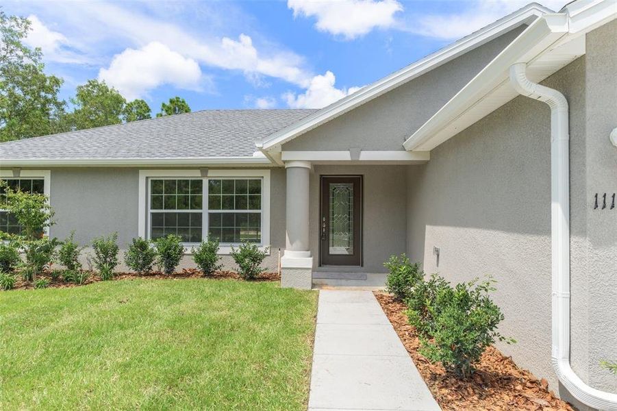 Exterior details and patio area of a home in , Brooksville (Image 3).
