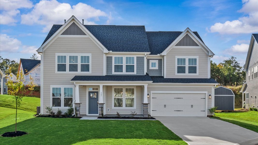 Representative exterior photo of a completed home built from the Stonefield by DRB Homes in Rosemary Grove, Greenville, SC (Image 2). Representative exterior photo of a completed home built from the Stonefield by DRB Homes in Rosemary Grove, Greenville, SC (Image 2).