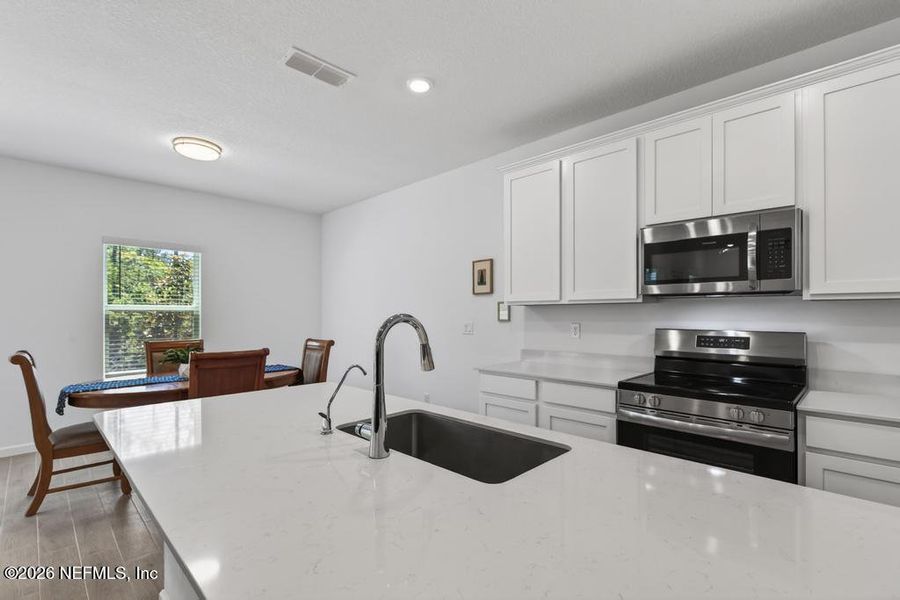 Furnished interior view inside a new home in St Augustine Lakes, St. Augustine (Image 15).