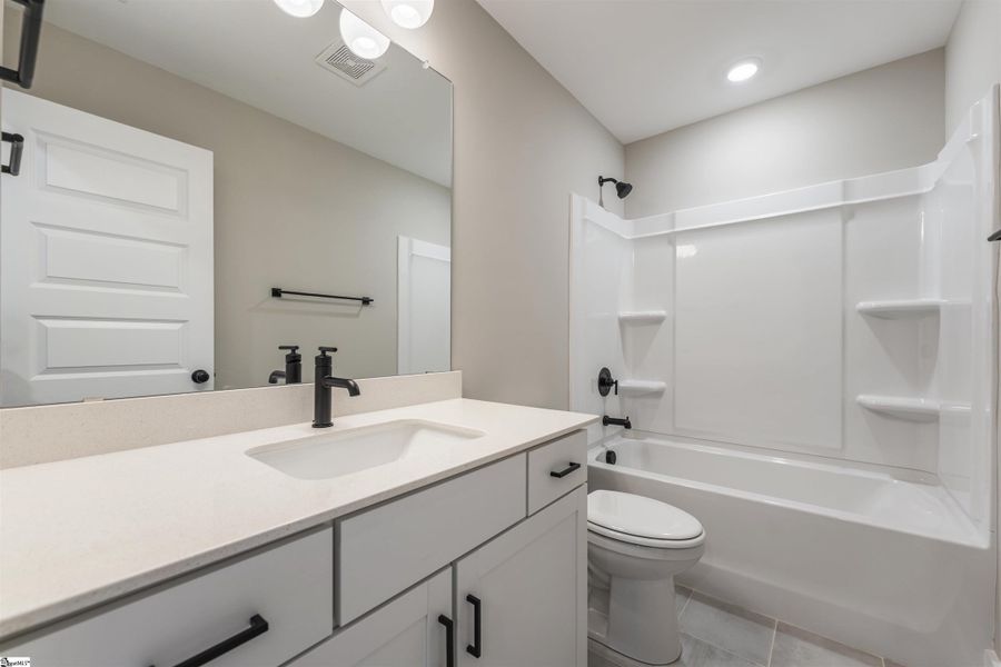 Furnished interior view inside a new home in Renaissance Place, Greenville (Image 8).