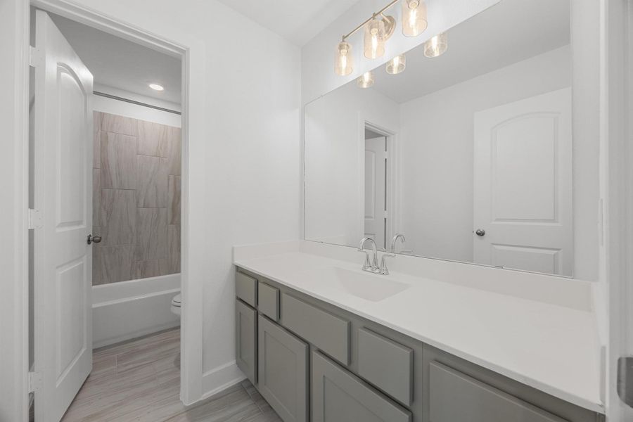 Furnished interior view inside a new home in Parmer Ranch - 40', Georgetown (Image 14).