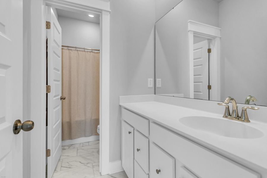 Furnished interior view inside a new home in Carnes Crossroads: Row Collection, Summerville (Image 11). Furnished interior view inside a new home in Carnes Crossroads: Row Collection, Summerville (Image 11).