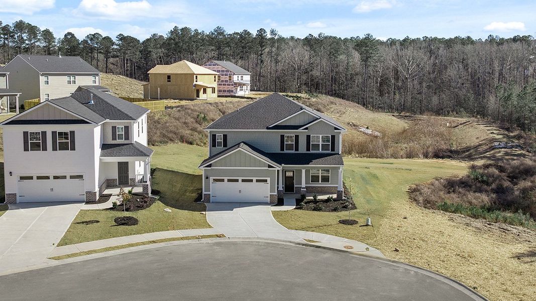 Front exterior of a new home in Southwind Village, Evans, GA, highlighting curb appeal (Image 2).