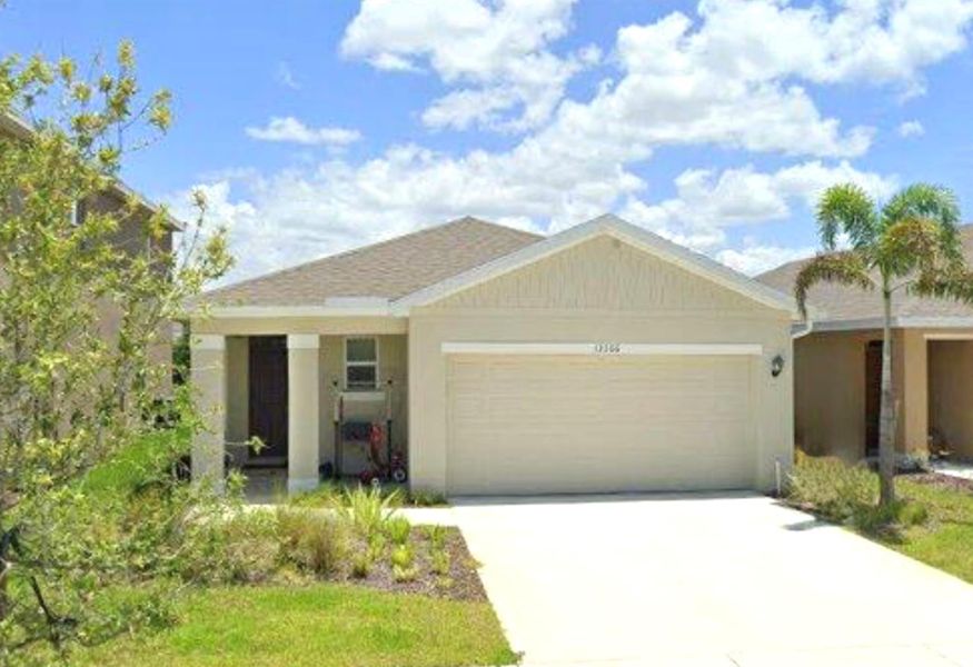 Front exterior of a new home in , Port St. Lucie, FL, highlighting curb appeal (Image 1). Front exterior of a new home in , Port St. Lucie, FL, highlighting curb appeal (Image 1).