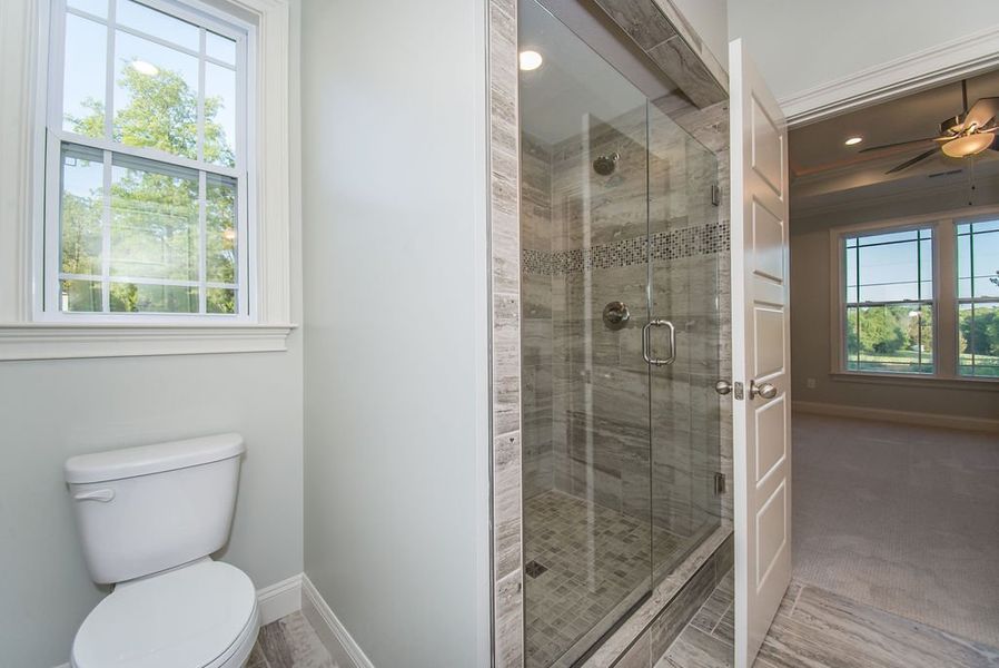 Representative furnished interior of a home built from the Mediterranean by Enchanted Homes in Messer Farms, Inman (Image 27).
