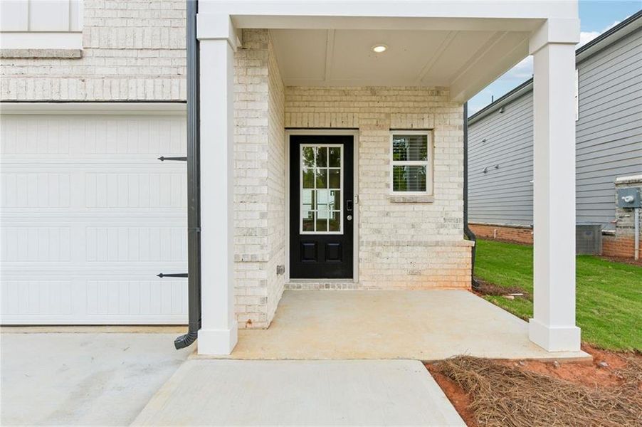 Exterior details and patio area of a home in Martin Springs - Reserve Series, Lawrenceville (Image 3). Exterior details and patio area of a home in Martin Springs - Reserve Series, Lawrenceville (Image 3).