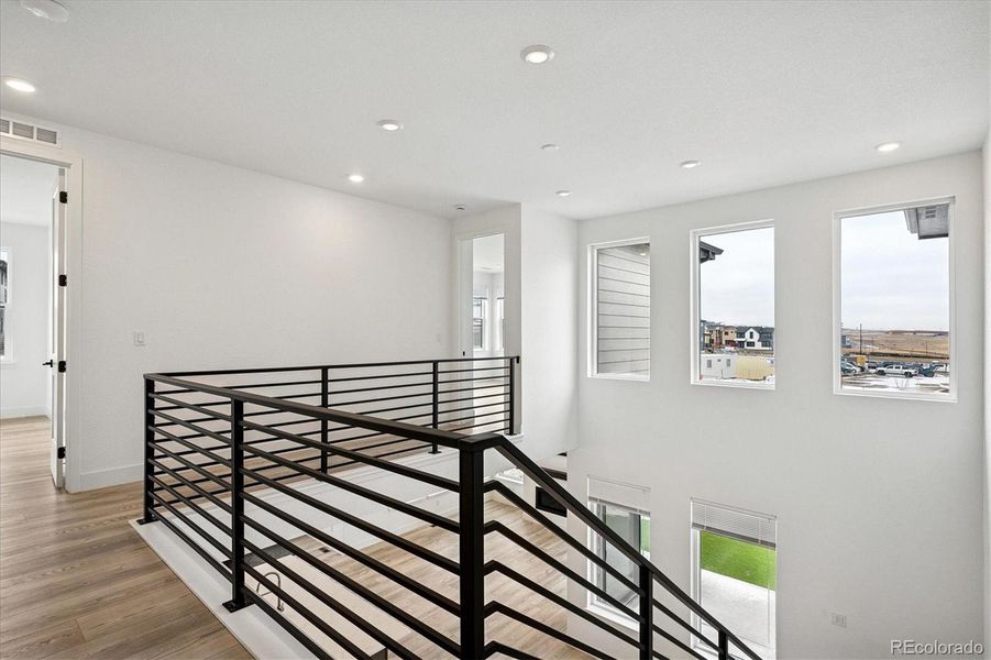 Horizontal iron railing creates open views Horizontal iron railing creates open views