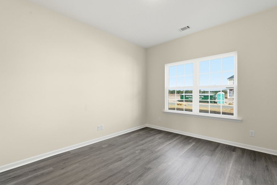 Representative unfurnished interior of a home built from the The Richland by RTS Homes in Grand Reserve, Hinesville (Image 28).